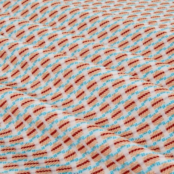 Tell a Woven Brocade Pattern From Added Embroidery