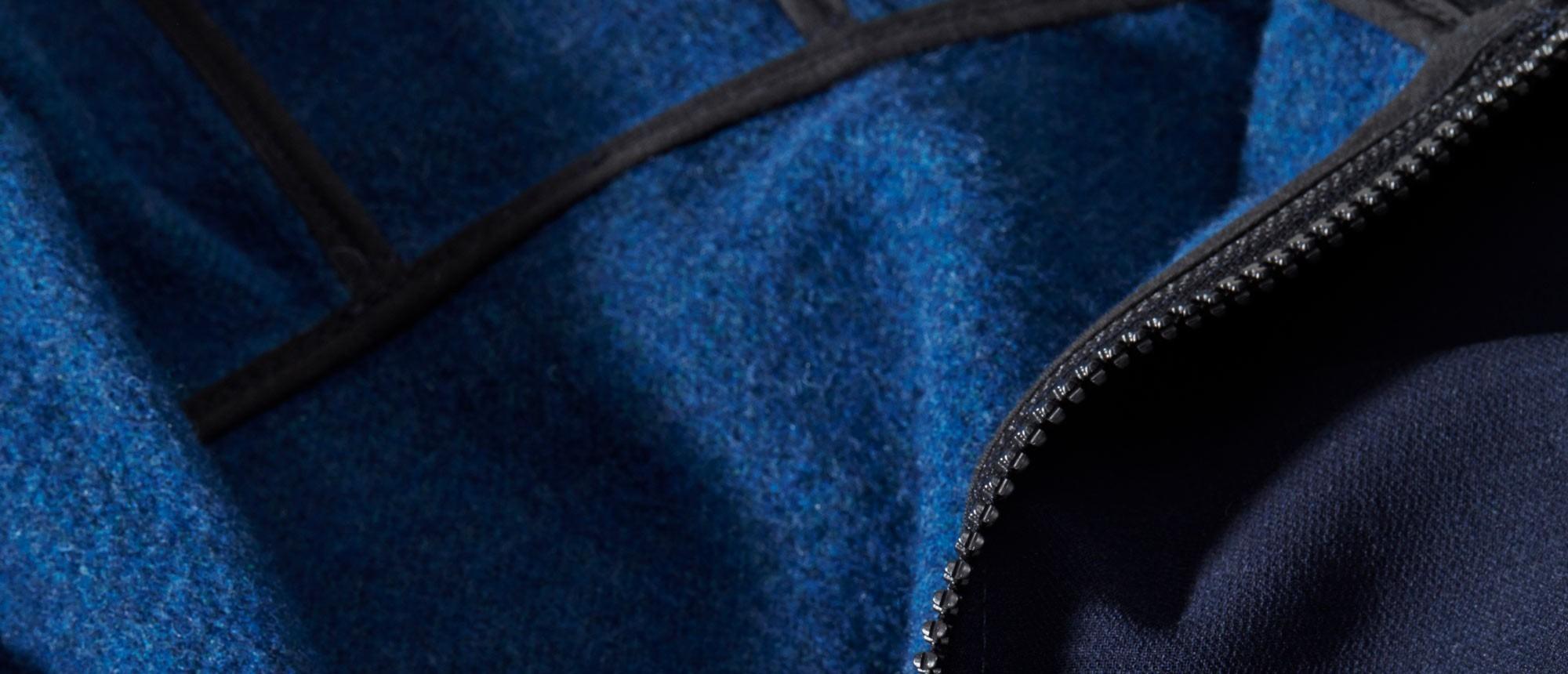 Close view of a blue OPTIM wool garment pictured by Woolmark.