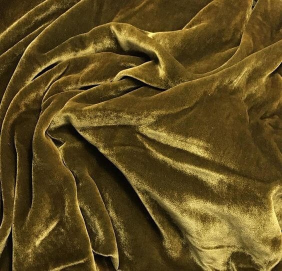 Gold-toned velvet fabric pictured in the source guide.