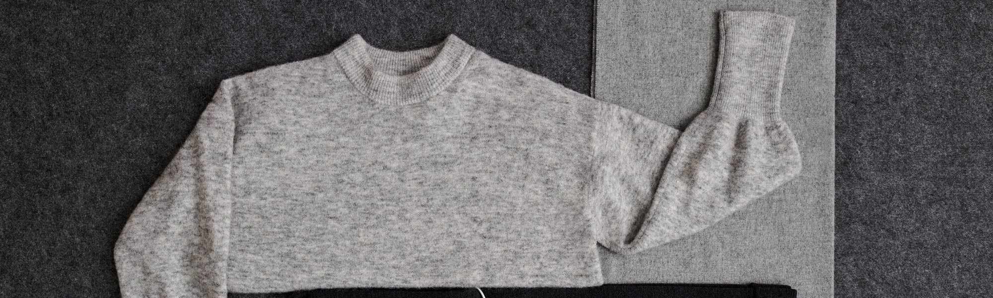 Grey knitted garment pictured in Woolmark's body-odor research article.