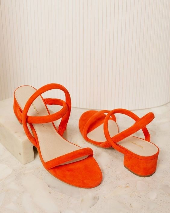 Orange sandals pictured in the source guide to suede.
