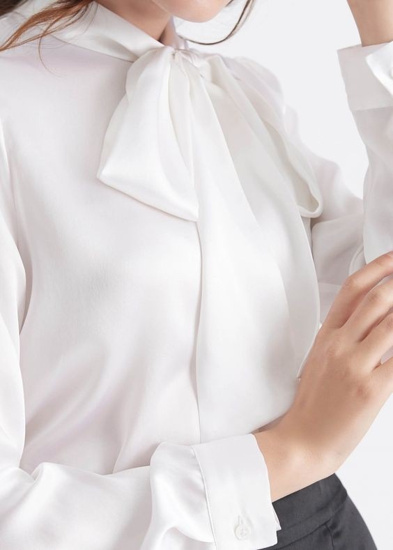 Silk blouse with a tied neckline pictured in the source guide.