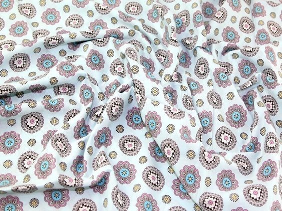 Printed cotton lawn dress fabric with a medallion pattern, shown in the source guide.