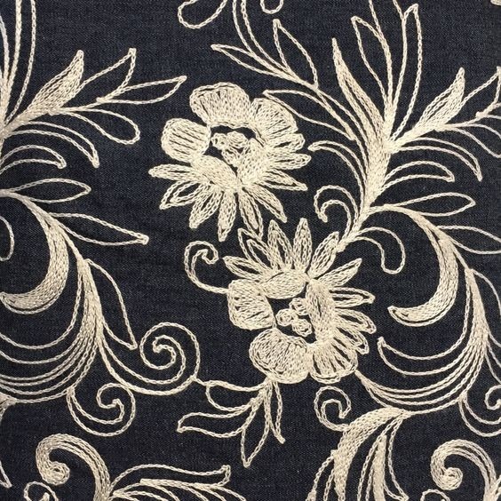 Embroidered chambray sample pictured in the source guide; the embroidery is a separate decorative feature.