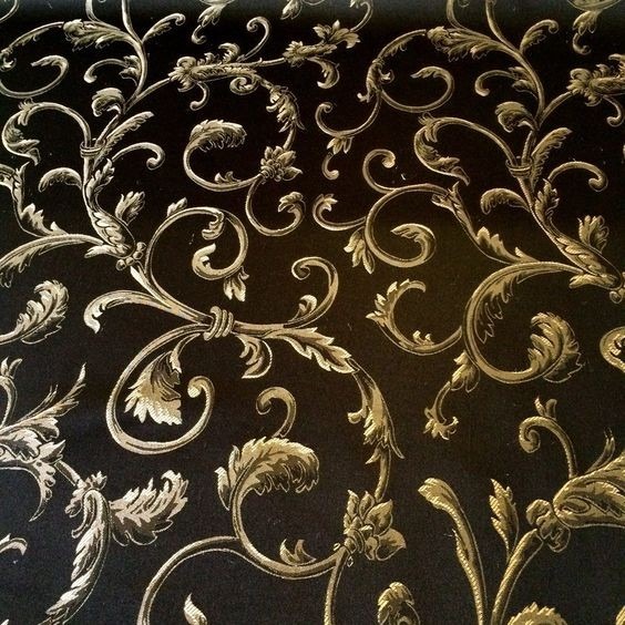 Black-and-gold patterned jacquard sample pictured in the source guide.